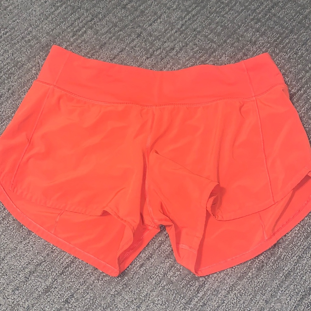 Orange Lululemon shorts